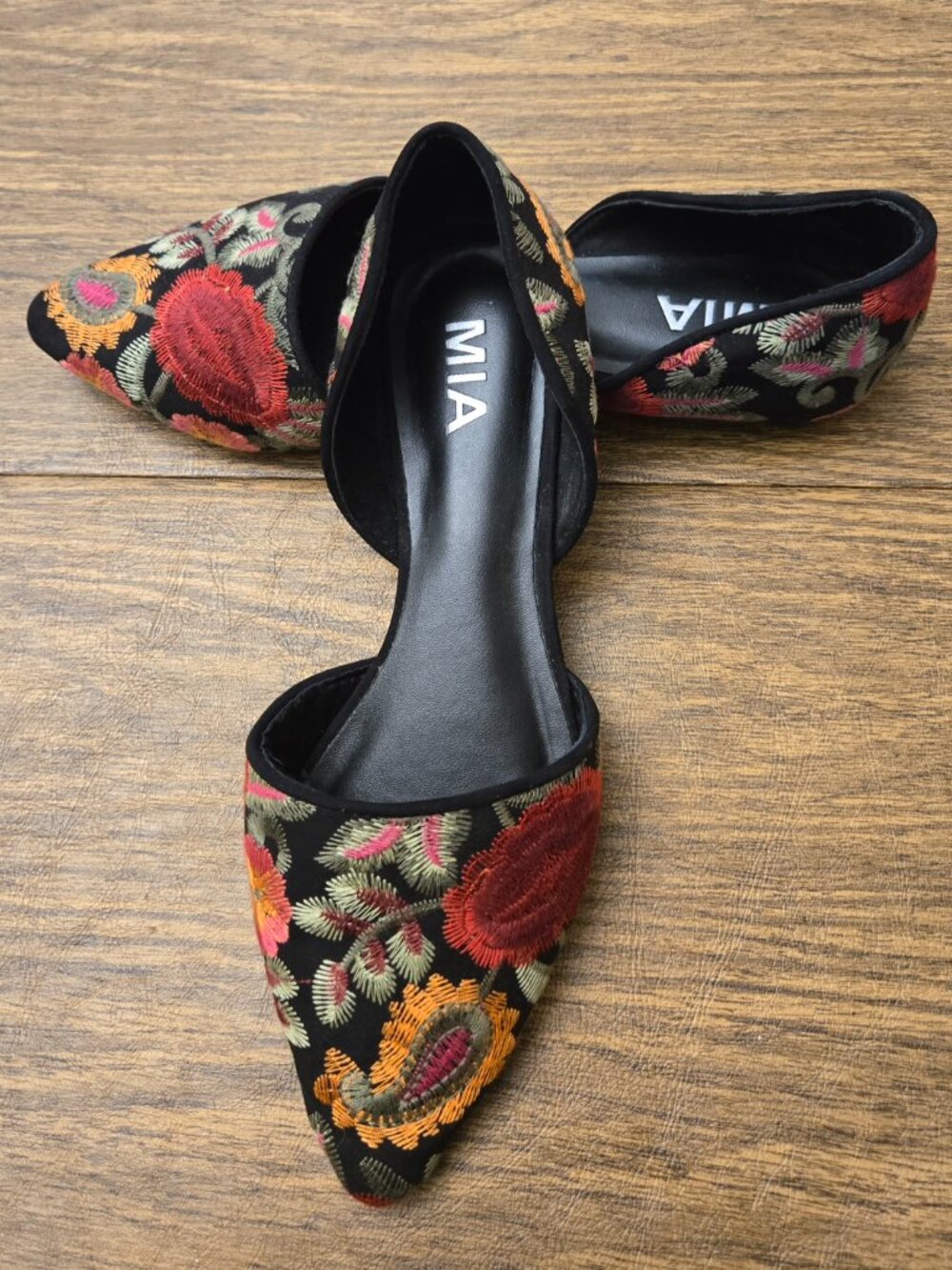 MIA Caroline Floral Embroidered d'Orsay Pointed Toe Flats on Black Background